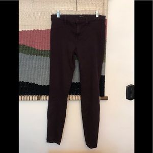 Burgundy j brand skinny jeans.